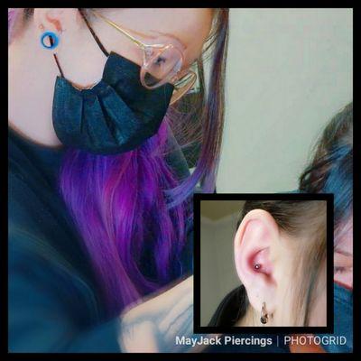 Owner and head piercer preforming a piercing.