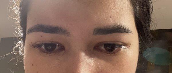 Right eyebrow has no shape and is cut short. Ew.