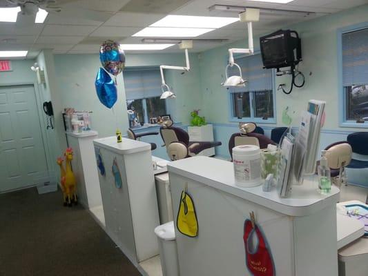 Social setup in this exam room with TV's at Pediatric Dental Associates in South Jersey in Cherry Hill, NJ