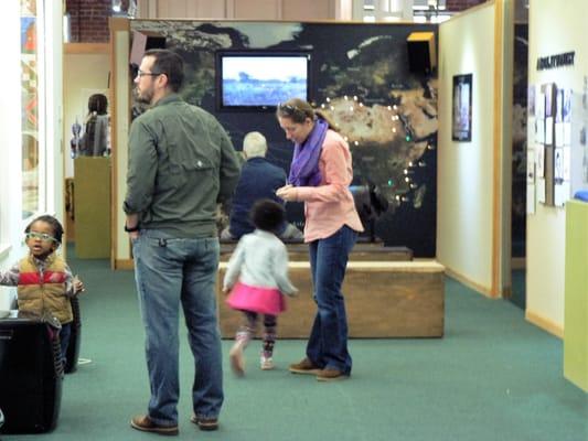 A family in our Gateway to Freedom exhibit.