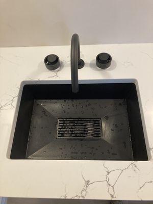 Full bathroom remodel with very cool sink zoom in