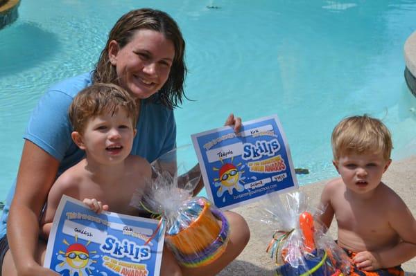 Sunsational Instructor with her two students showing off the certificates they earned!