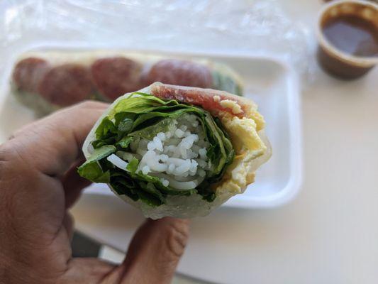 Sausage spring roll - that yellow stuff is egg!