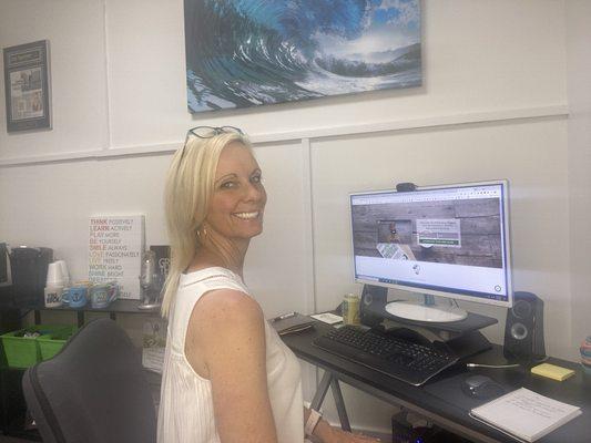 April O'Leary, publisher, working in our headquarter offices.