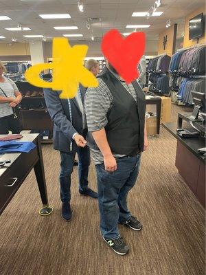 Fiancé at suit fitting