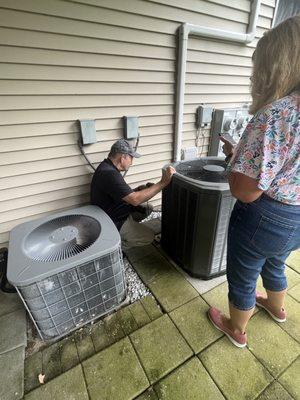 Ron checking out the deck and air conditioning unit.