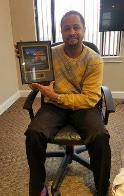 Vista Points appreciates its employees.  Here is Lennon Harris, Financial Services Coordinator, receiving a much deserved award.