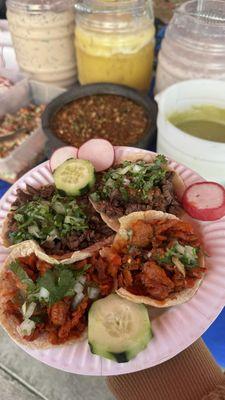 Tacos al pastor and asada with salsa de molcajete