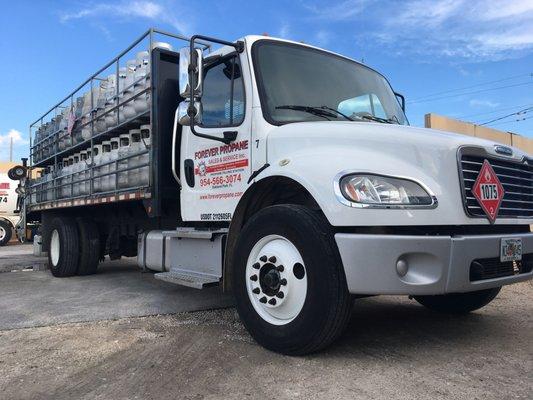 Cylinder truck loaded and ready to deliver tanks to your business!