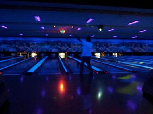 Hubby bowling at glow bowl