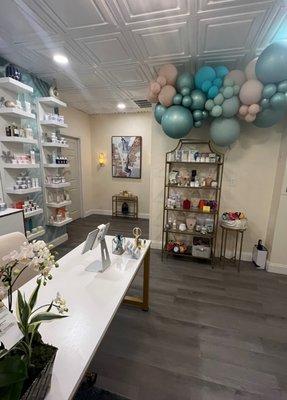 Spa lobby and boutique with skin care and gift items.