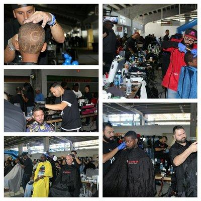 Cutting hair for the homeless and family's in need.  At the He GOT UP event.