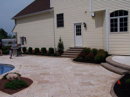 Travertine Tile pool installation