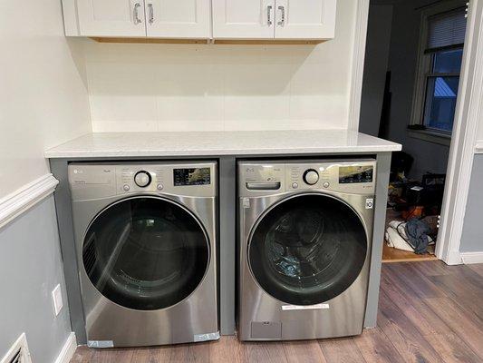 My laundry area with my new countertop.