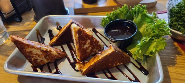 Fried cheese with raspberry and balsamic vinegar