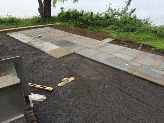 Blue stone patio installation