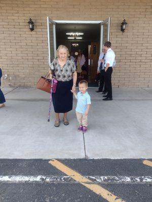 Even sweet little guys to walk out the seniors after service