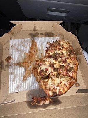 Half eaten employee pizza