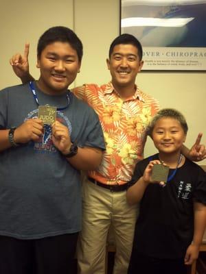 Two of our super chiro kids, Kailer & Kade with their Junior National's Judo gold medals!