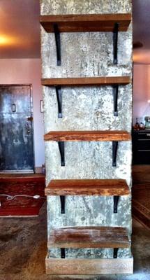 Stan's handywork on my shelves.  hung these babies in 1 hr flat...yes that is CONCRETE!!