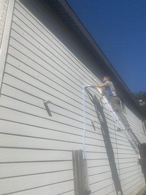 Injection foam into a hardie board exterior home