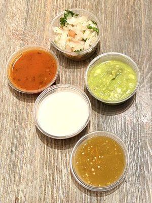 Salsas, guacamole, sour cream, and pico de gallo. Paid extra for the sour cream and guacamole.