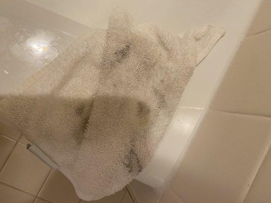 Dirty wash cloth found in tub