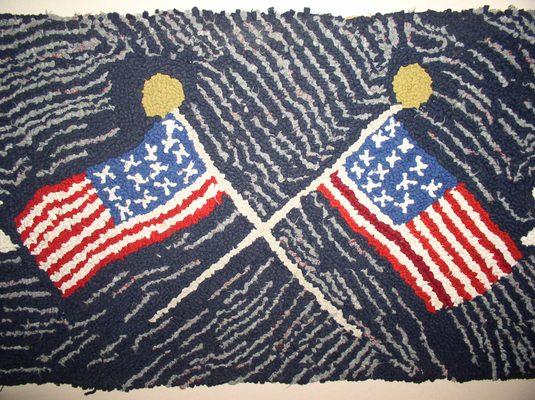 American Folk Art Hooked Table Mat of the 20th century.