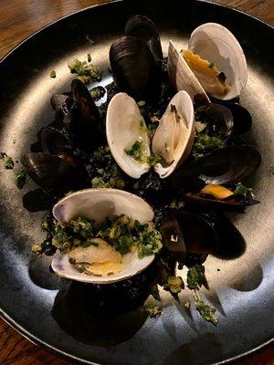 Squid ink risotto with mussels and clams