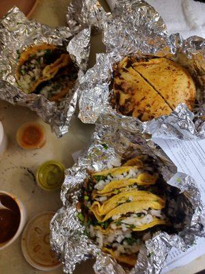 Barbacoa and birria tacos with beef fajita torta.