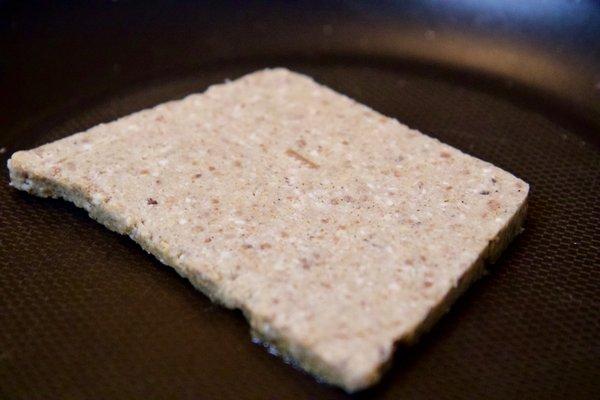 Scrapple: traditionally a mush of pork scraps and trimmings combined with cornmeal and wheat flour, often buckwheat flour, and spices.