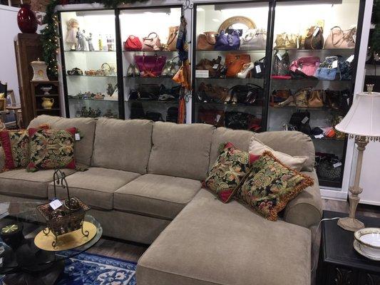 Gently used flex steel couch. Great selection of women hand bags. What a awesome store.