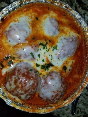 Baked stuffed shells with meatballs