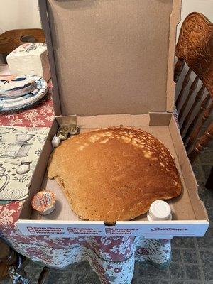 Gigantic pancakes! It comes in a pizza box.