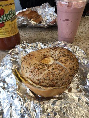 Everything bagel with a fresh juice smoothie!