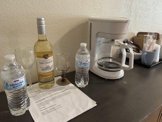 Complimentary bottle of wine and two bottled waters