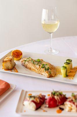 Our Yellowtail Snapper, with delicate rolled zucchini and indulgent potato pave, is a canvas of flavors brought to life.