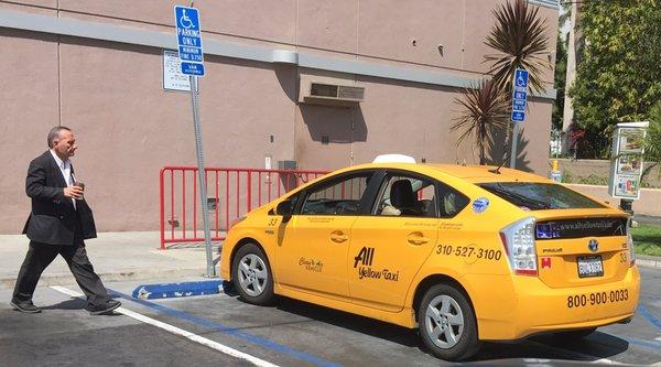 I wouldn't trust a driver who takes a disabled person's parking spot. And no, the taxi driver did not have a placard.