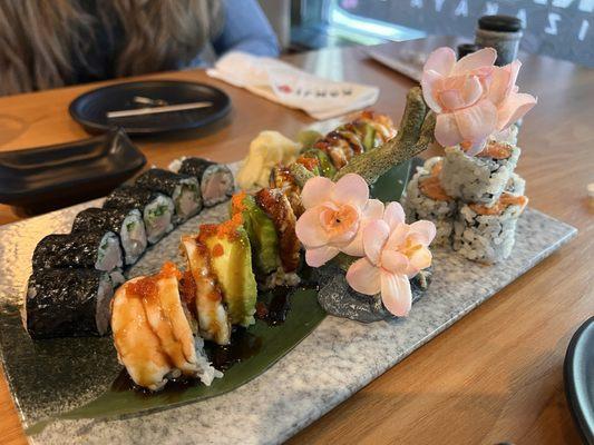 Tool box roll, spicy crunch tuna roll, and the yellowtail scallion roll