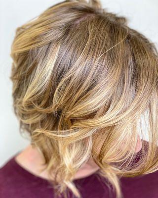 Dark blonde or light brown hair with blonde balayage