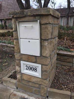 Stone mailbox with security locking insert and cast stone address block