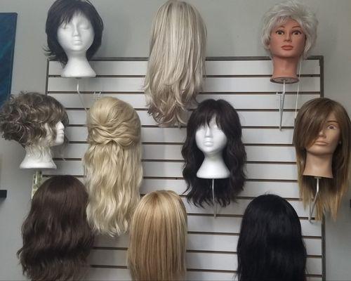 Human hair wigs and toppers