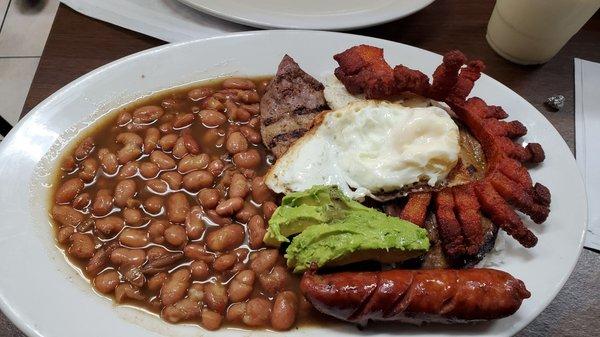 Bandeja paisa. Good portion, really cheap. And pretty flavorful for the place.