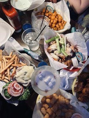 House burger, southwest tater tots, buffalo cauliflower wings, garlic parmesan wings