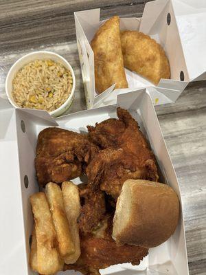 Campero fried chicken, yuca, campero rice, and empanadas