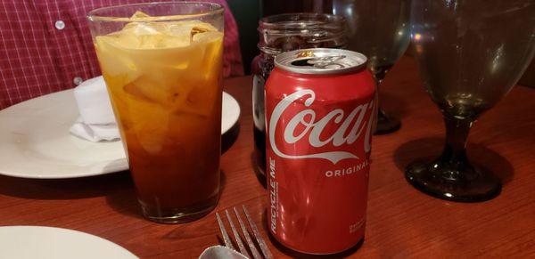 Thai ice tea, coke in can (mason jar filled with ice and straw provided)  and citrus infused ice water