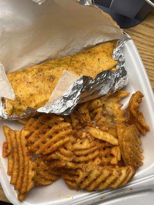 Chicken ceaser wrap with waffle fries! (The fries are so good. If you like seasoned fries this is your fry!)