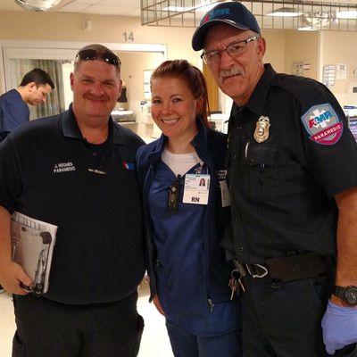 Instructor taking time to take a picture with past students