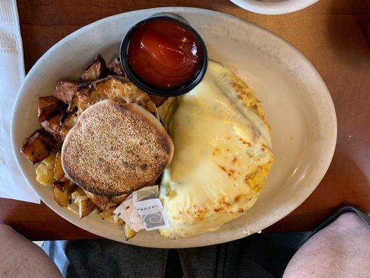 Omelette, home fries and English muffins