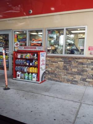 Small little convenience store with doors on both sides.